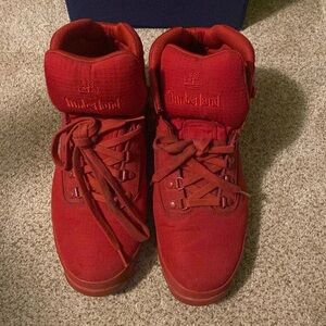 Timberland boots size 11. Color: Red. Minor wear great pickup for this winter.